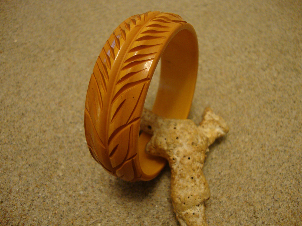 Vintage Goldenrod Bakelite Bracelet: Carved Vine & Leaf Design