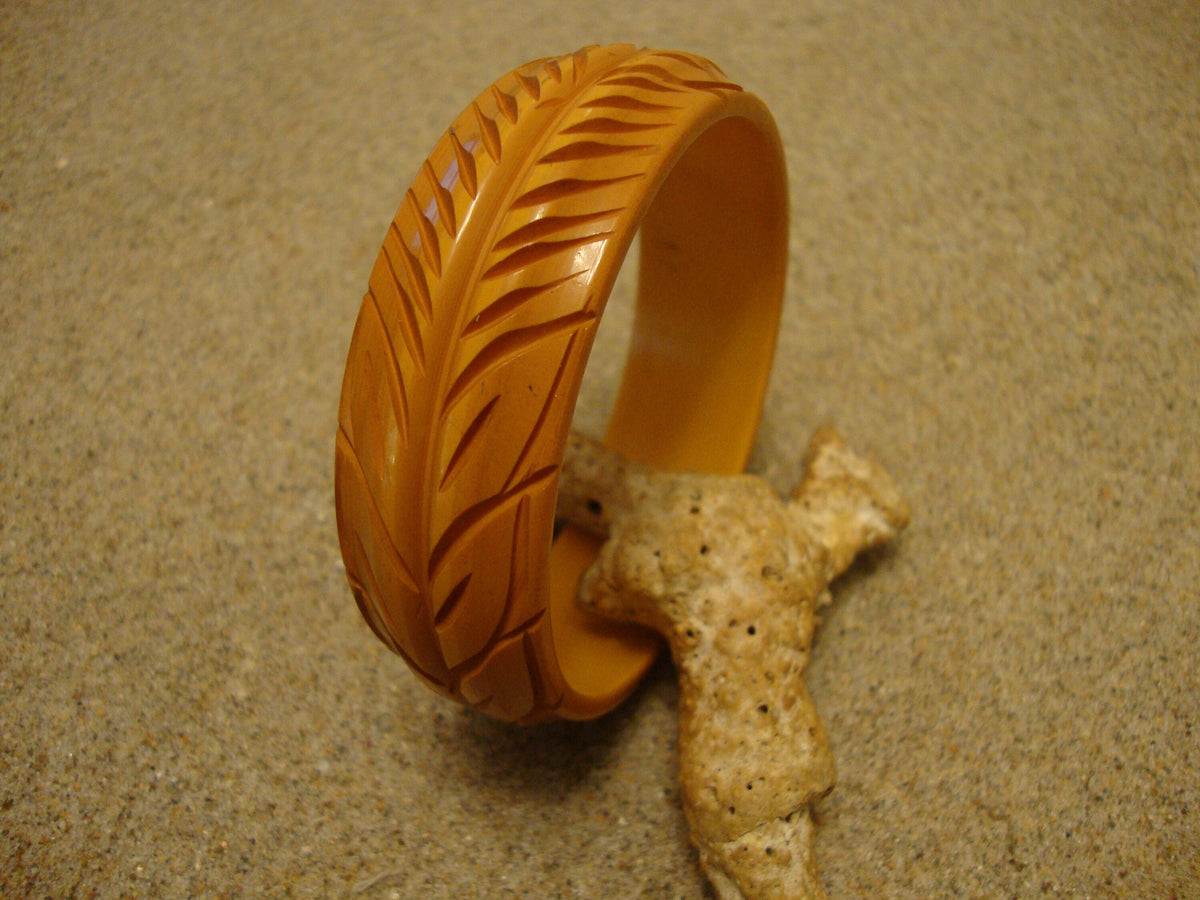 Vintage Goldenrod Bakelite Bracelet: Carved Vine & Leaf Design