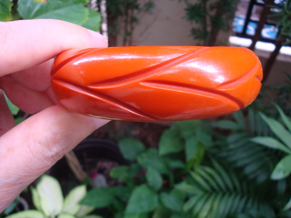 Vintage Burnt Orange Bakelite Bracelet: Abstract Vine Carvings