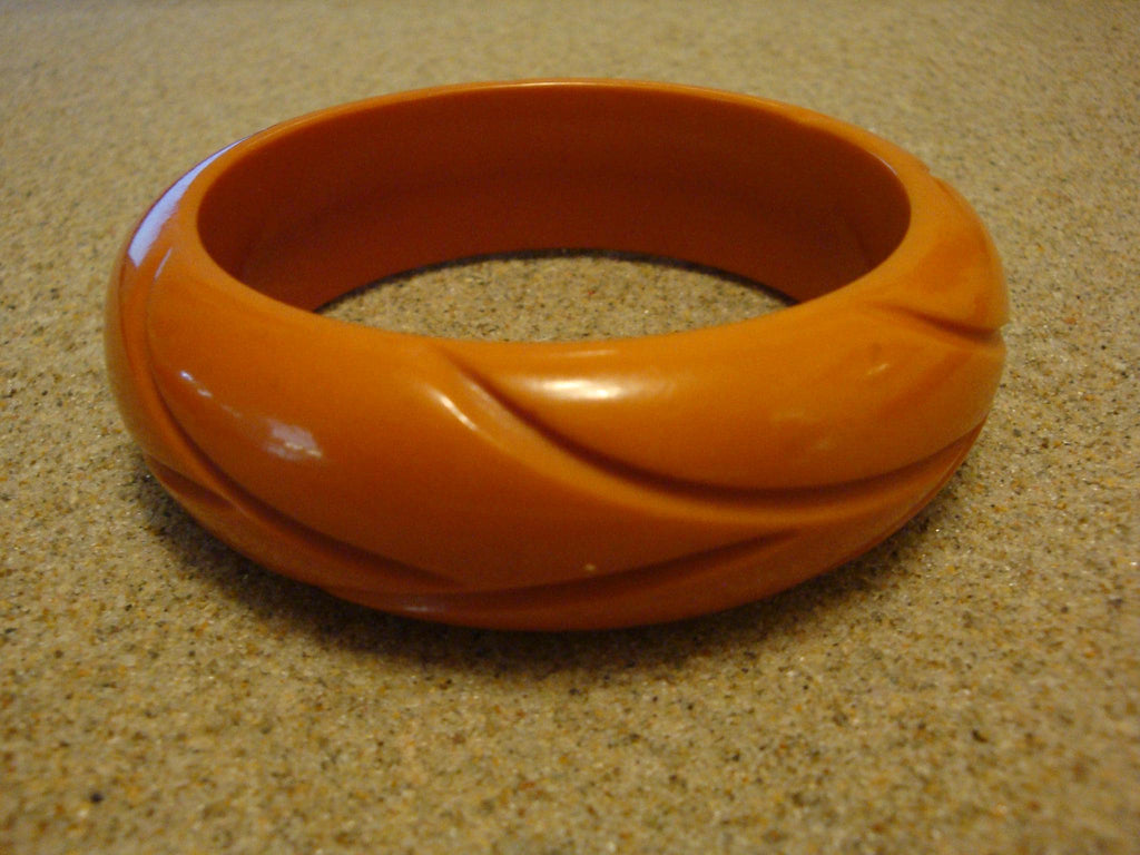 Vintage Burnt Orange Bakelite Bracelet: Abstract Vine Carvings