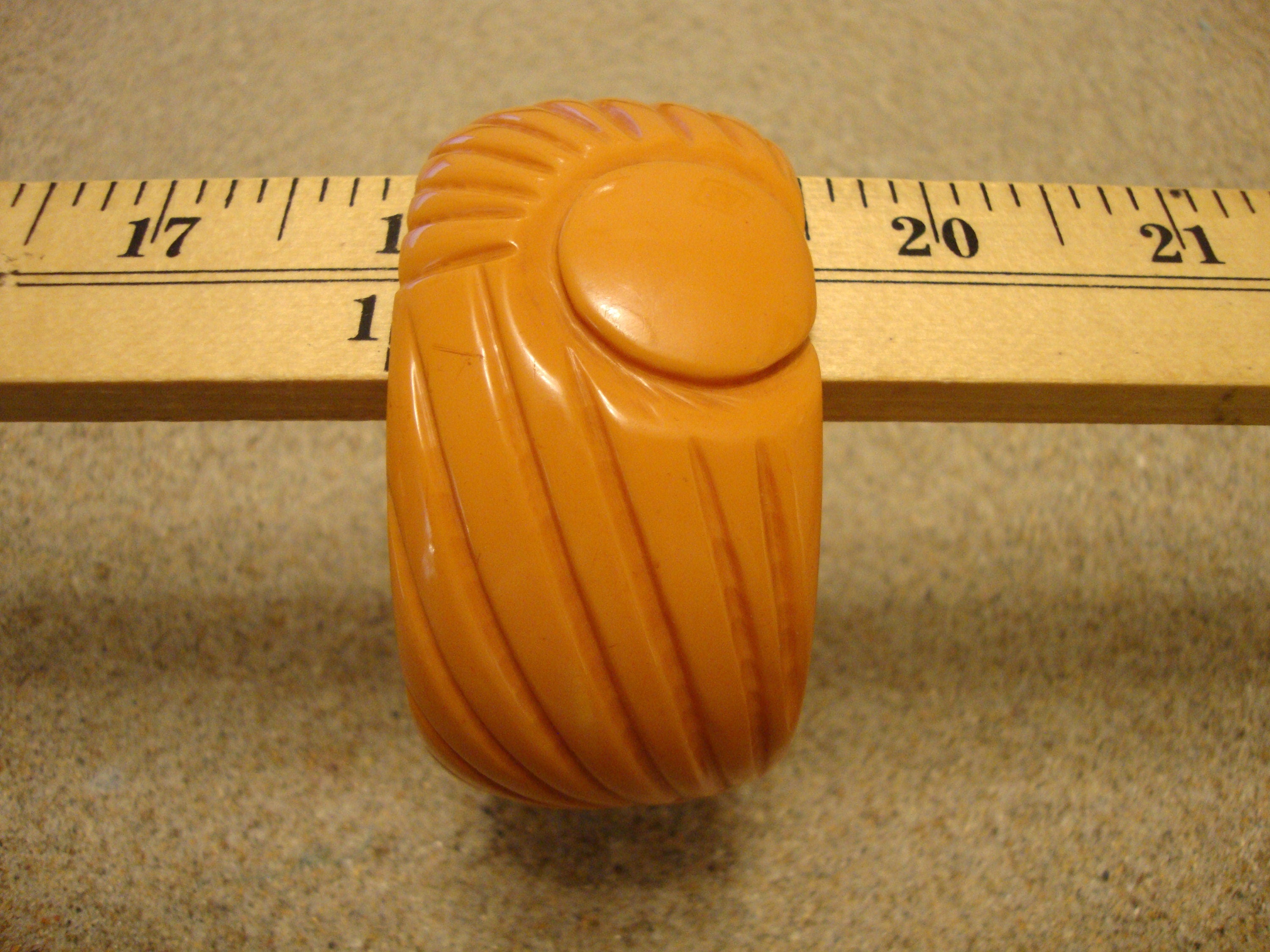 Vintage 1.5" Goldenrod Bakelite Bracelet! Abstract Flower/Sun? Carved Design!