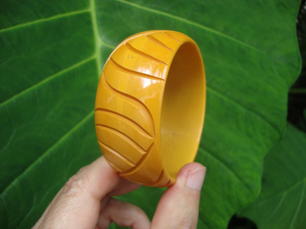 Vintage 1.5" Goldenrod Bakelite Bracelet! Abstract Flower/Leaf Carved Design!