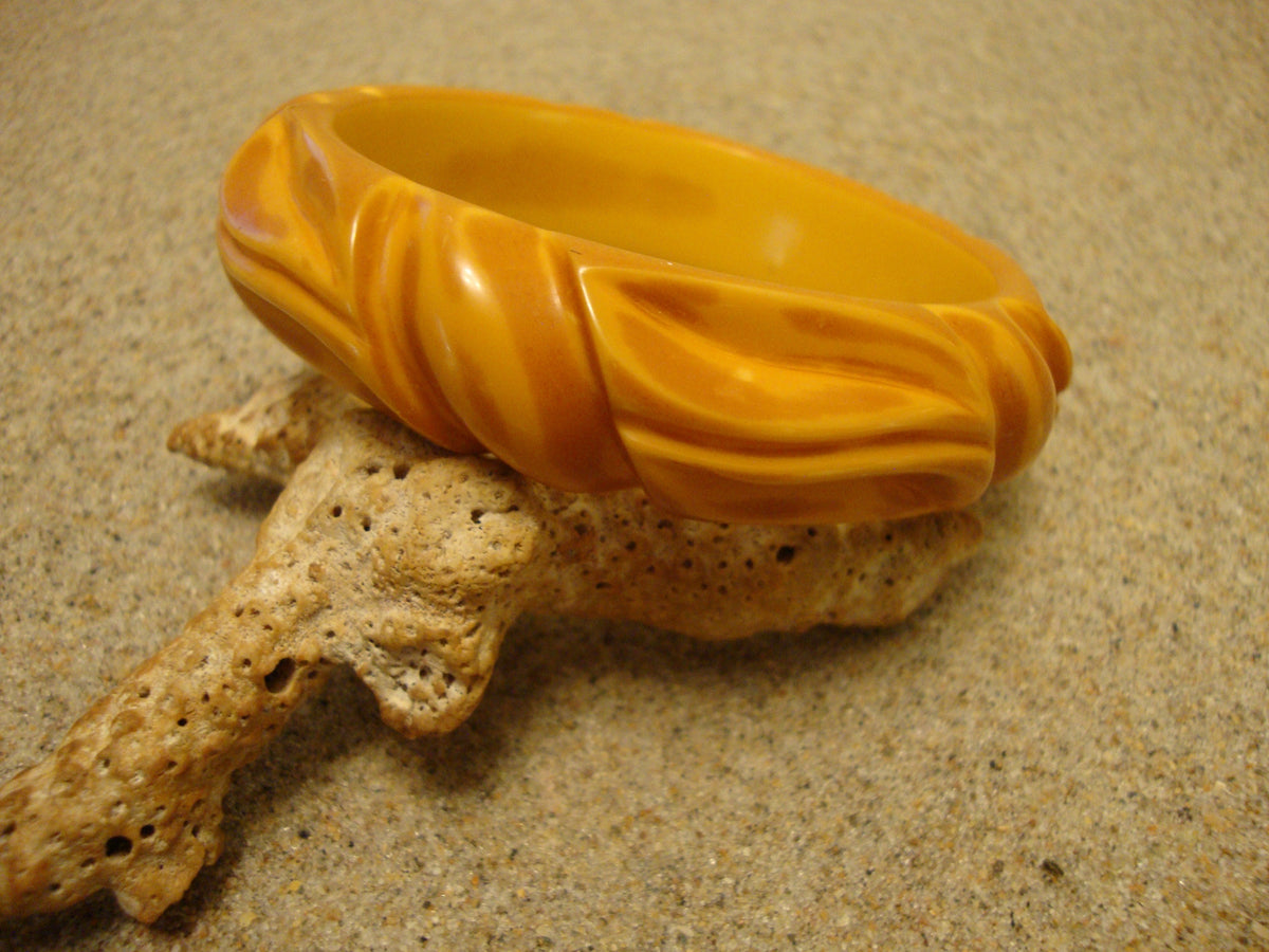 Vintage 3/4" Overdyed Butterscotch Bakelite Bracelet! Abstract Flower Carvings!