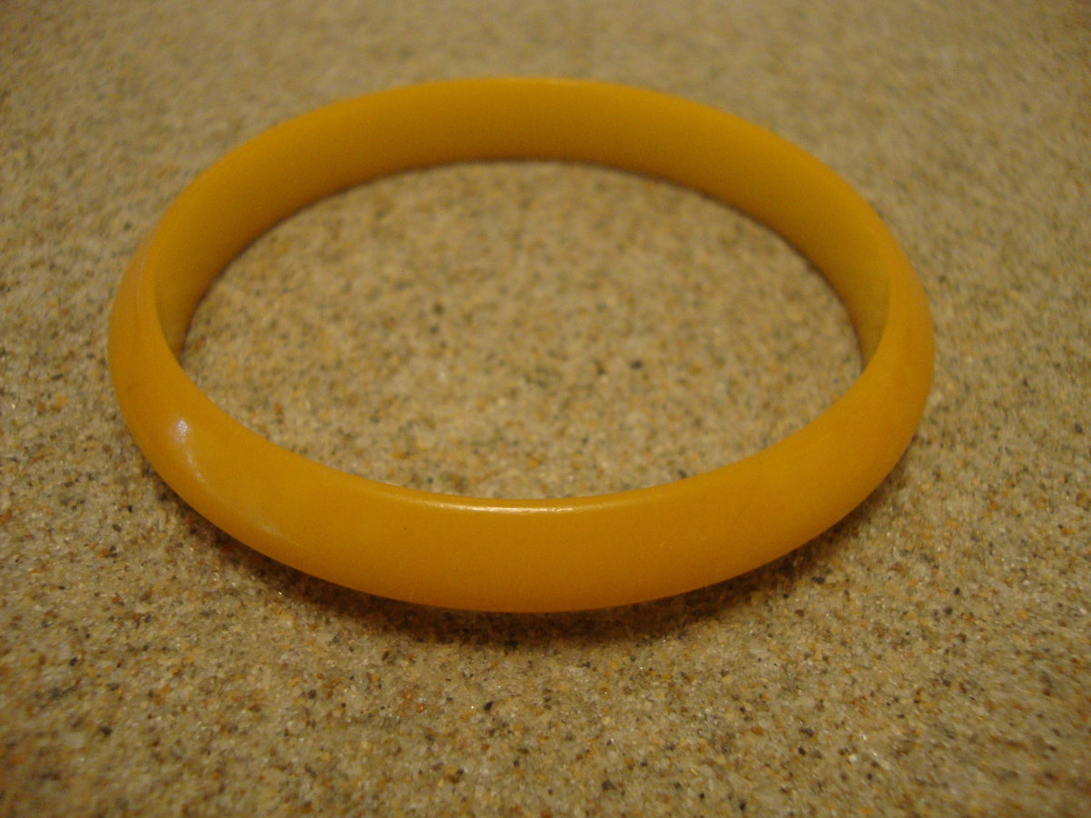 Vintage Lemon Yellow Bakelite Bracelet: Flying Saucer Bangle