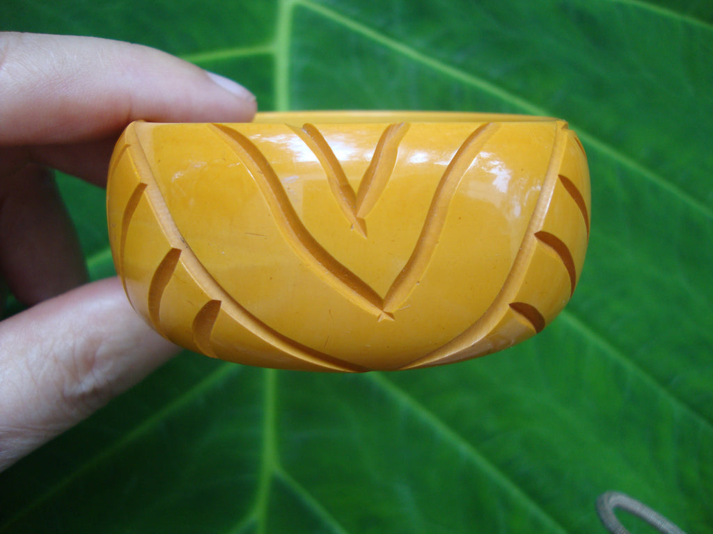 Vintage 1.5" Goldenrod Bakelite Bracelet! Abstract Flower/Leaf Carved Design!