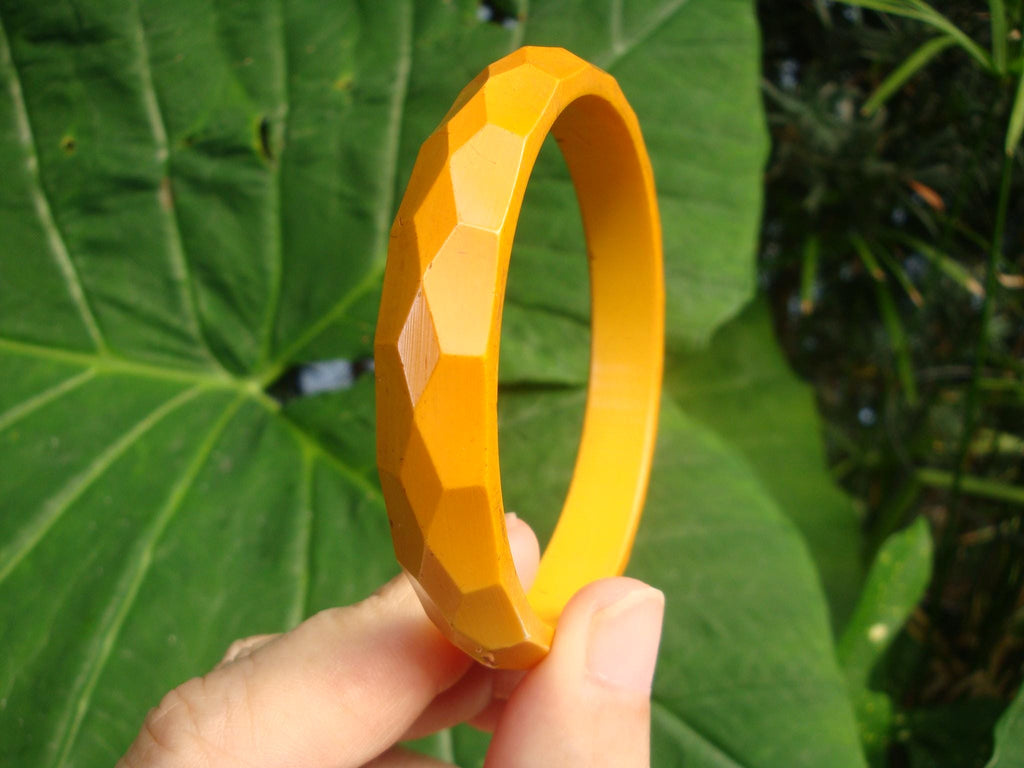 Vintage 1/2" Goldenrod Bakelite Bracelet w/ Diamond & Pentagon Shaped Facets!
