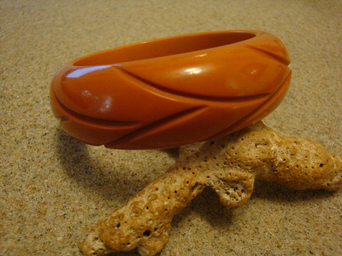 Vintage Burnt Orange Bakelite Bracelet: Abstract Vine Carvings
