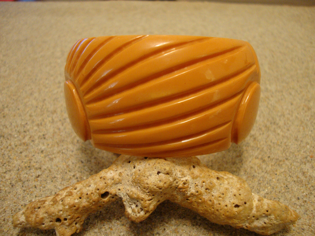 Vintage 1.5" Goldenrod Bakelite Bracelet! Abstract Flower/Sun? Carved Design!