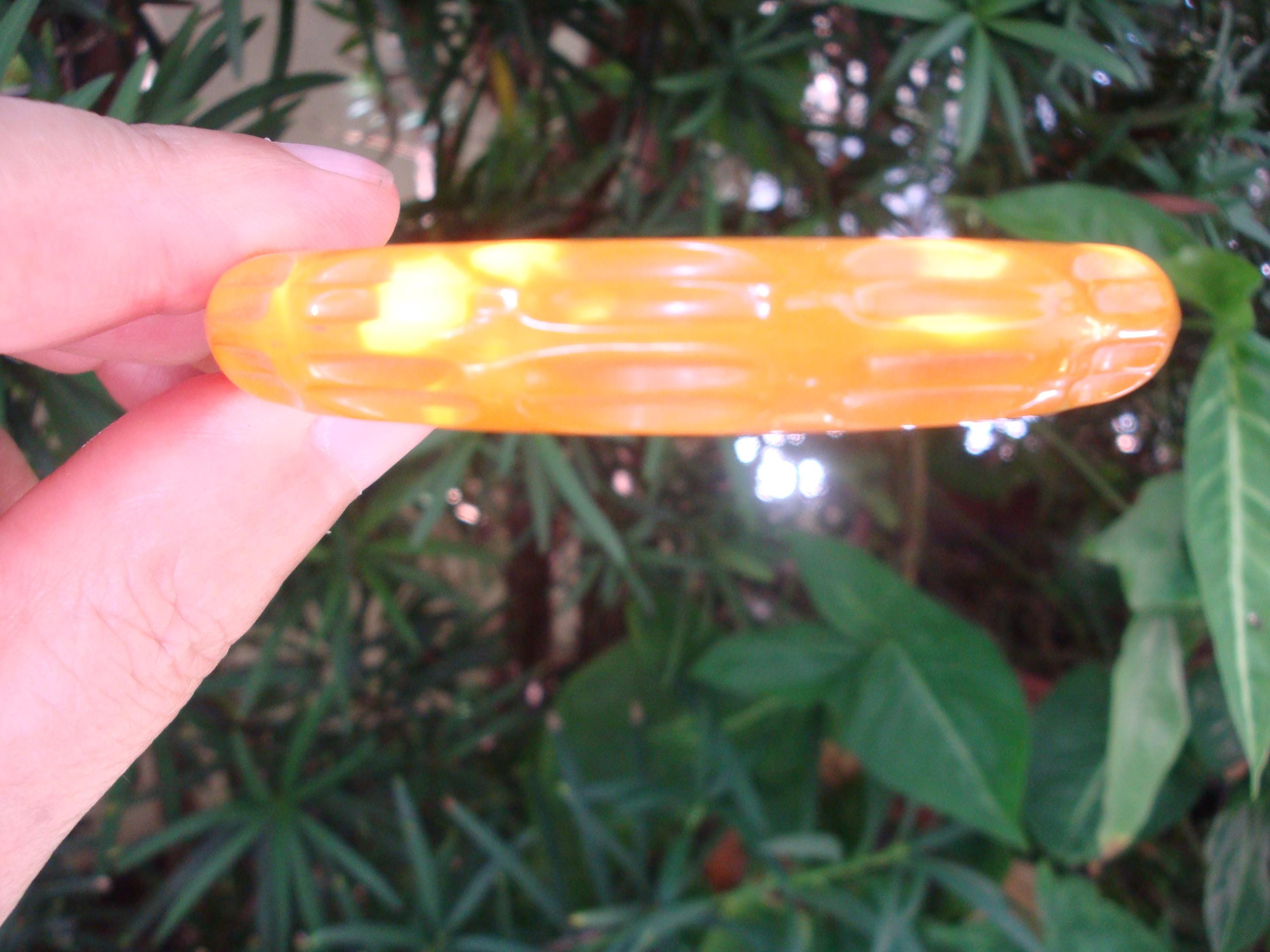 Vintage Goldenrod Bakelite Bracelet: Carved Thumbprint Design