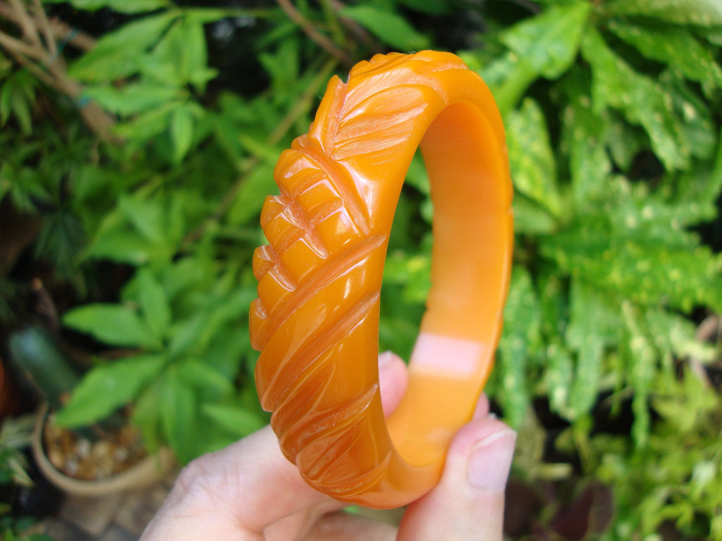 Vintage 3/4" Semi Translucent Orange Bakelite Bracelet! Pineapple/Leaf Carvings!