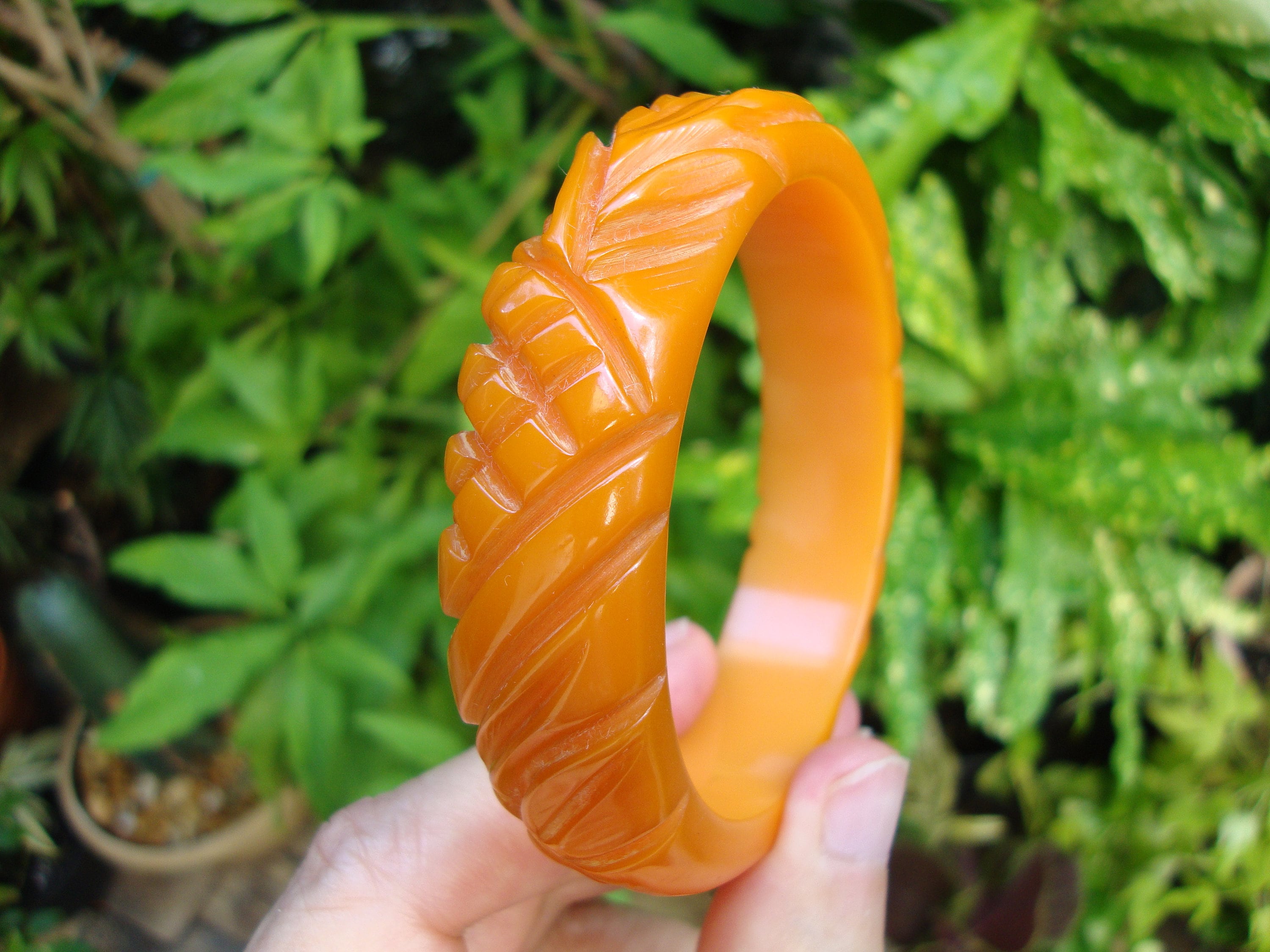 Vintage 3/4" Semi Translucent Orange Bakelite Bracelet! Pineapple/Leaf Carvings!