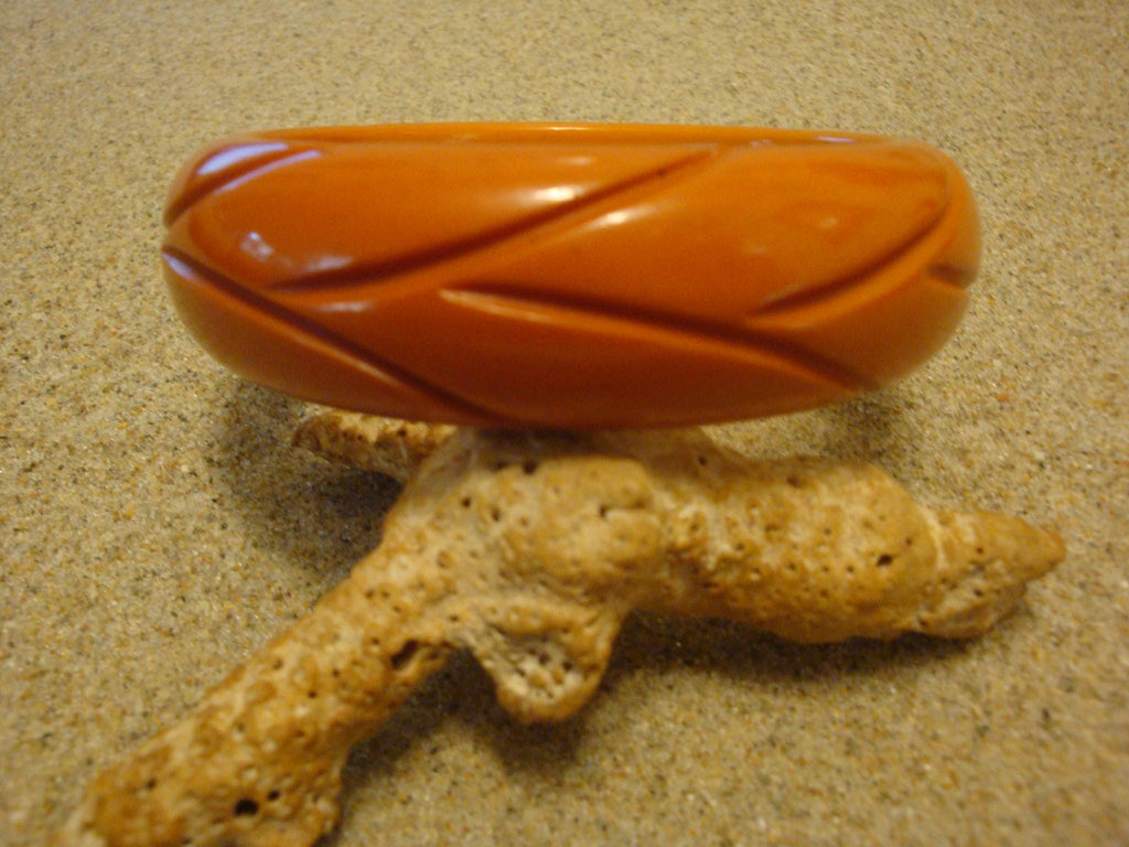 Vintage Burnt Orange Bakelite Bracelet: Abstract Vine Carvings