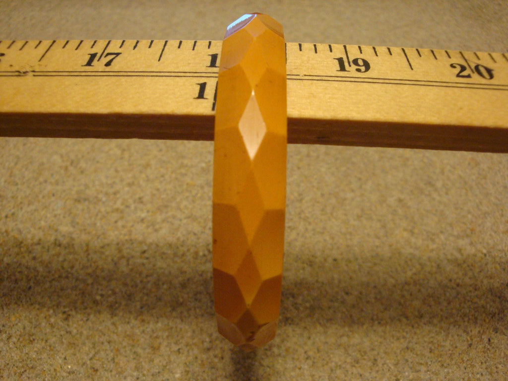 Vintage 1/2" Goldenrod Bakelite Bracelet w/ Diamond & Pentagon Shaped Facets!