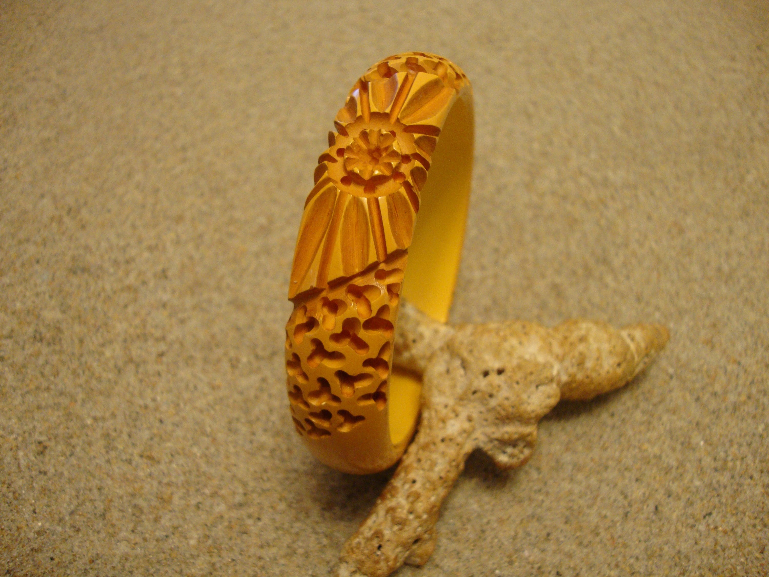 Vintage Goldenrod Bakelite Bracelet: Carved Flower & Wormwood Design