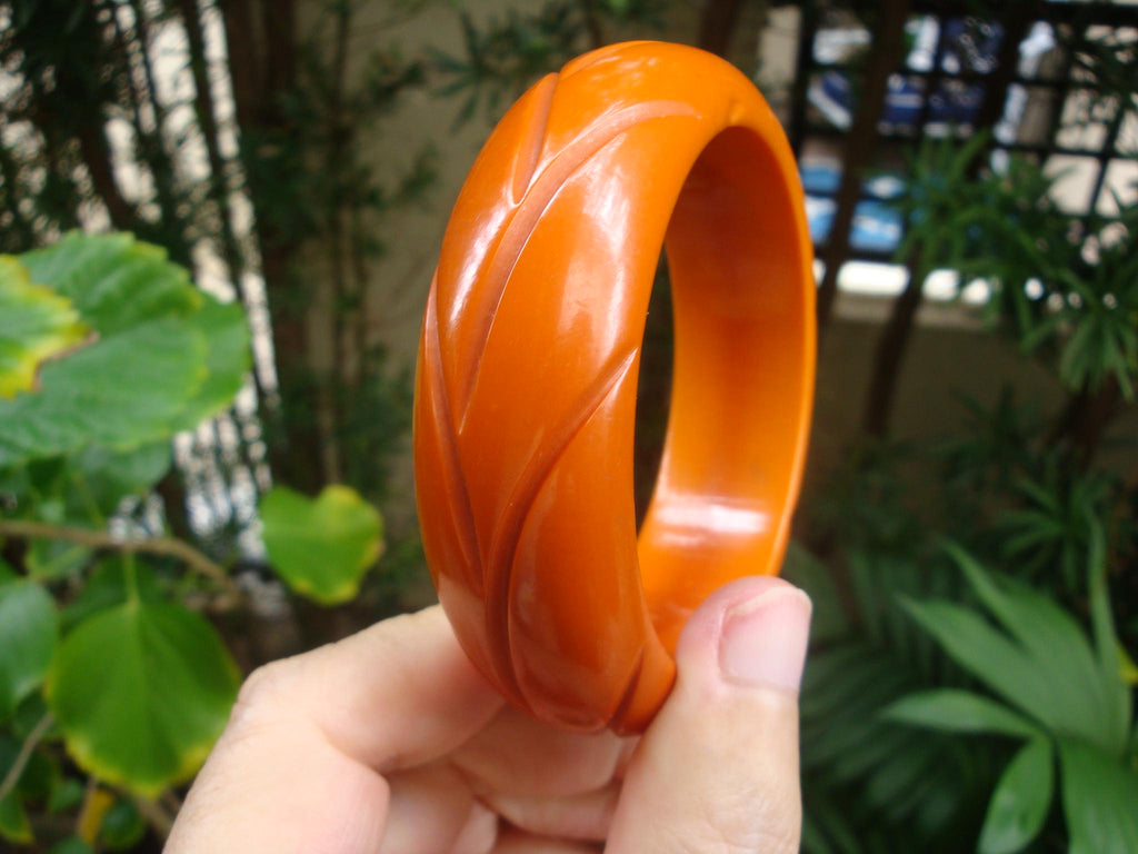 Vintage Burnt Orange Bakelite Bracelet: Abstract Vine Carvings