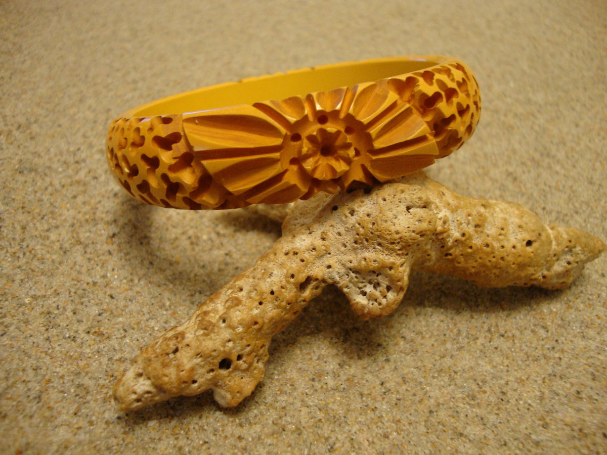 Vintage Goldenrod Bakelite Bracelet: Carved Flower & Wormwood Design