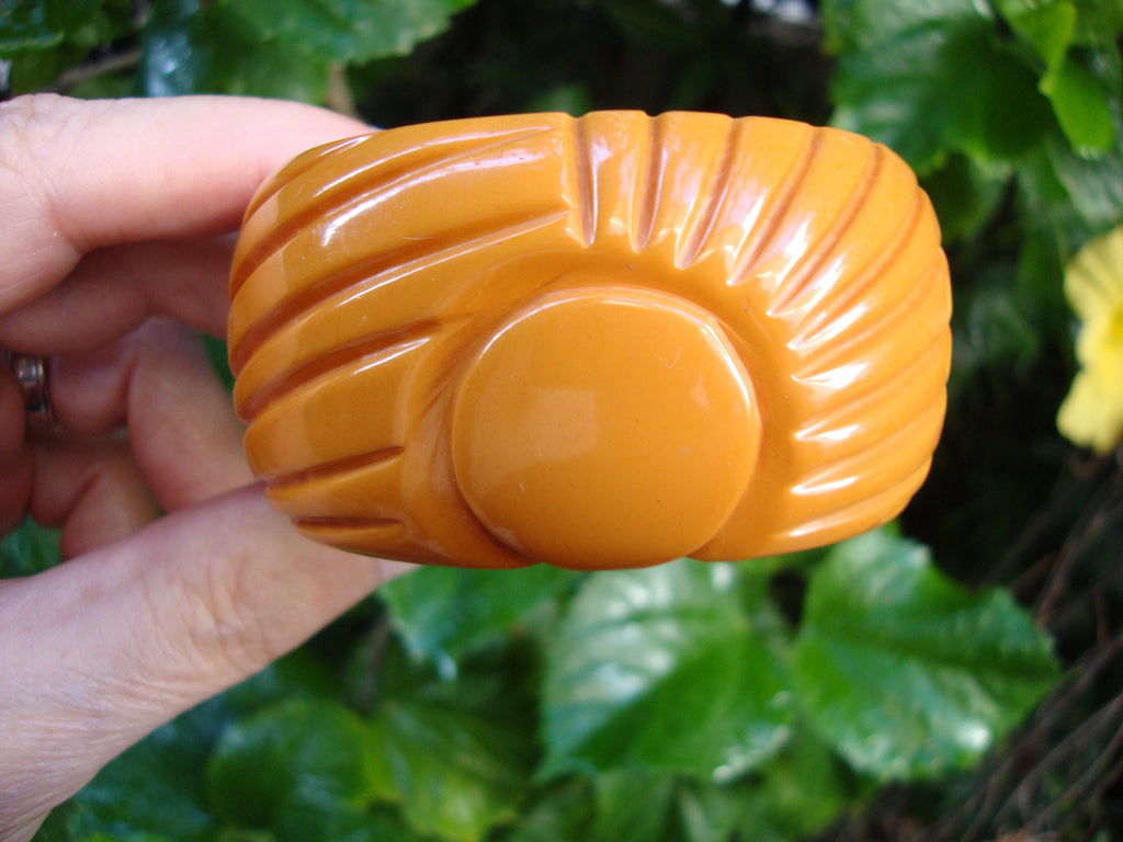 Vintage 1.5" Goldenrod Bakelite Bracelet! Abstract Flower/Sun? Carved Design!