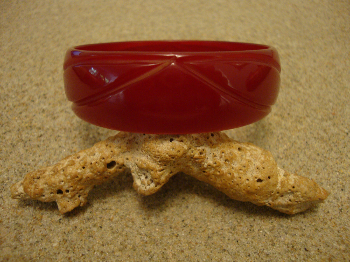 Vintage Ruby Red Bakelite Bracelet: Abstract Flower Carvings