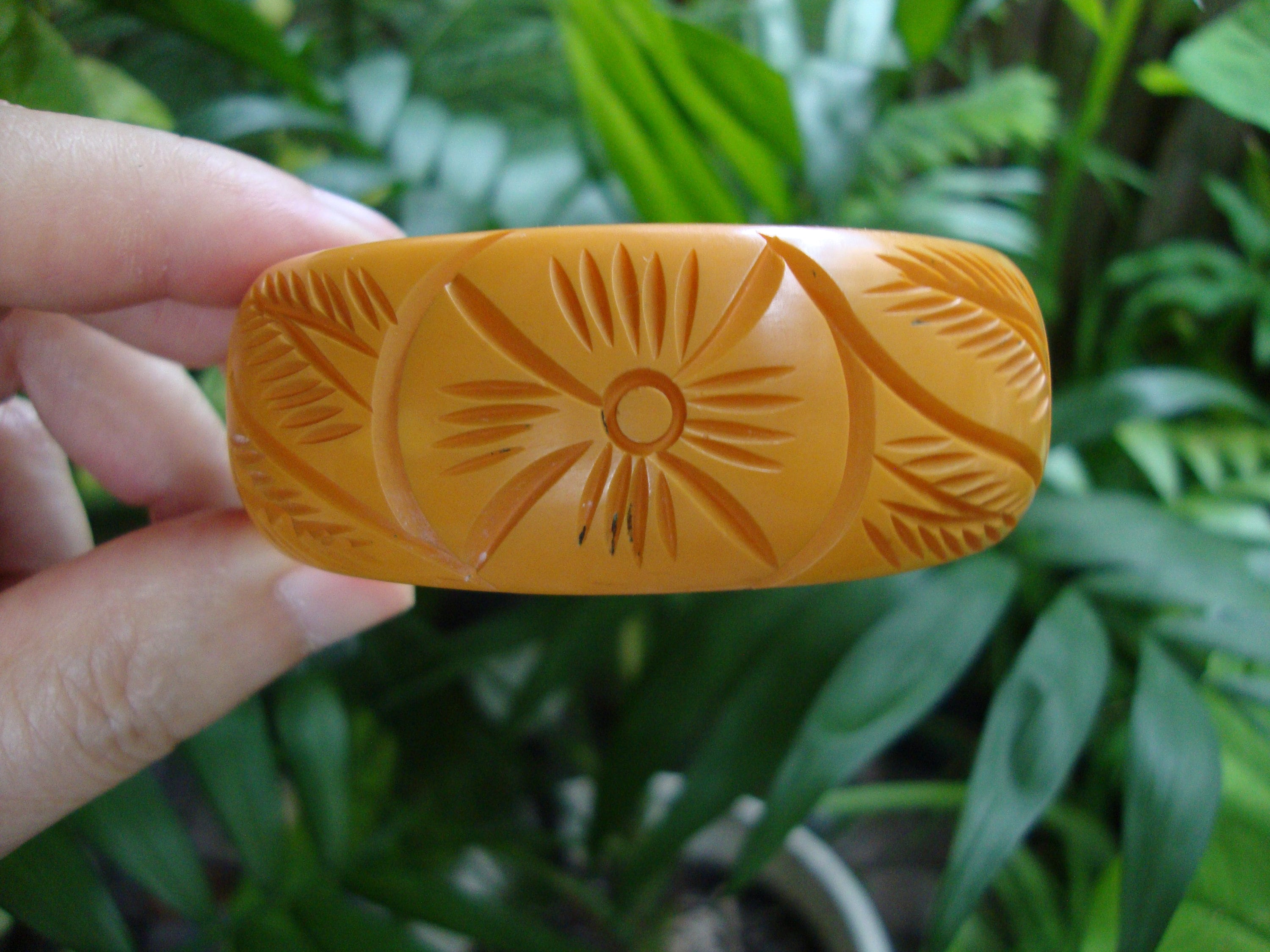 Vintage Goldenrod Bakelite Bracelet: Abstract Floral Carvings