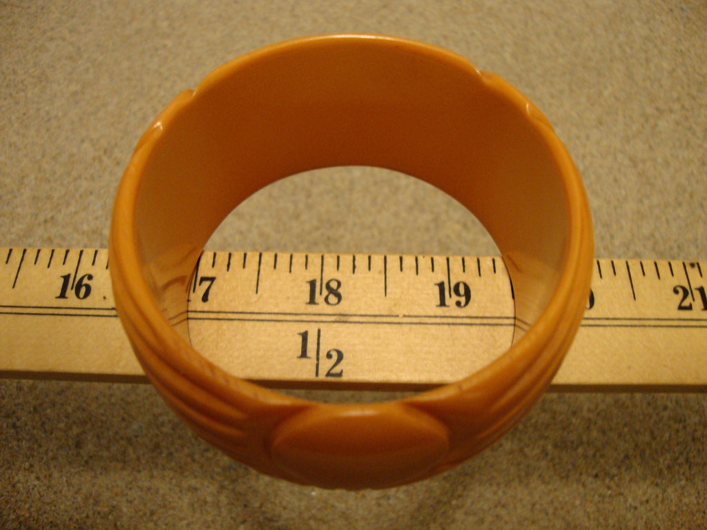 Vintage 1.5" Goldenrod Bakelite Bracelet! Abstract Flower/Sun? Carved Design!