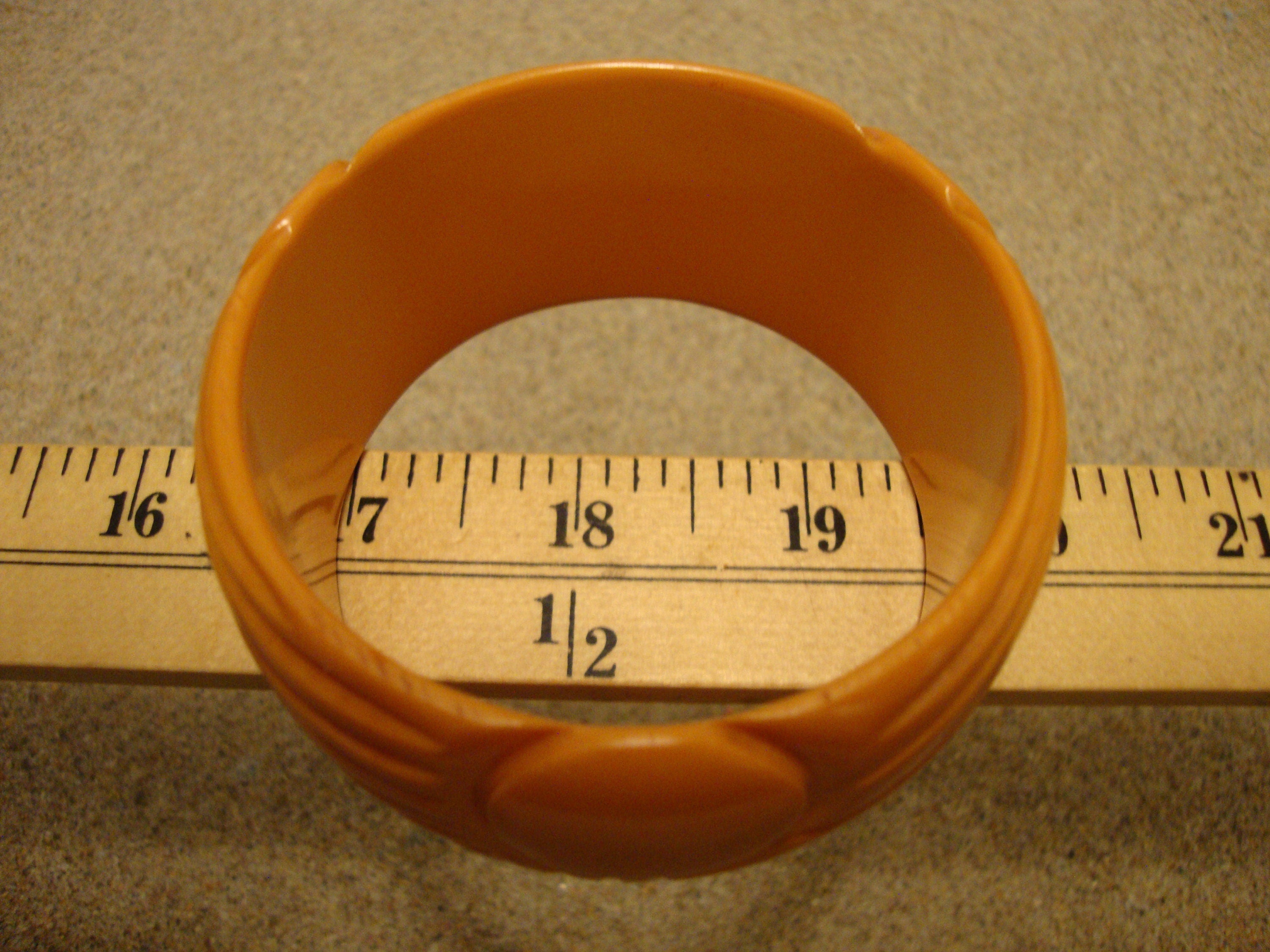 Vintage 1.5" Goldenrod Bakelite Bracelet! Abstract Flower/Sun? Carved Design!
