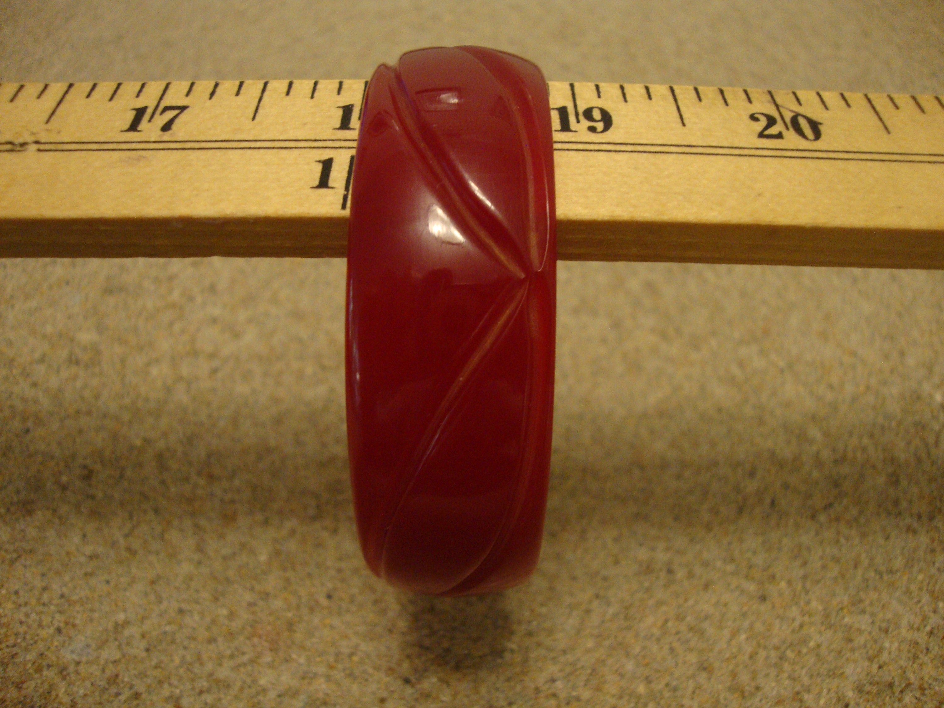 Vintage Ruby Red Bakelite Bracelet: Abstract Flower Carvings