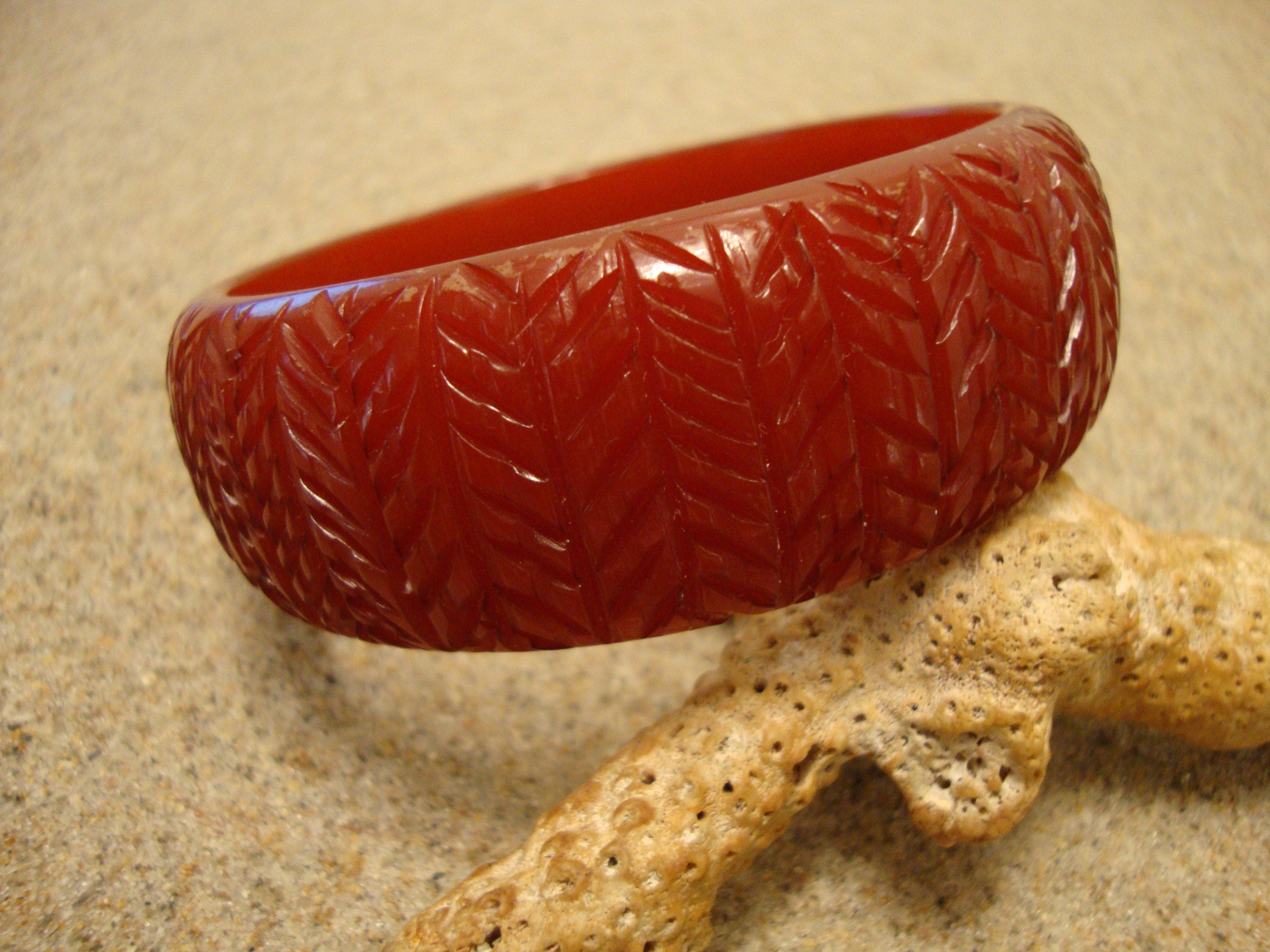 Vintage 1" Bakelite Bracelet! Blood Orange w/ Vertical Branch/Leaf Carvings!