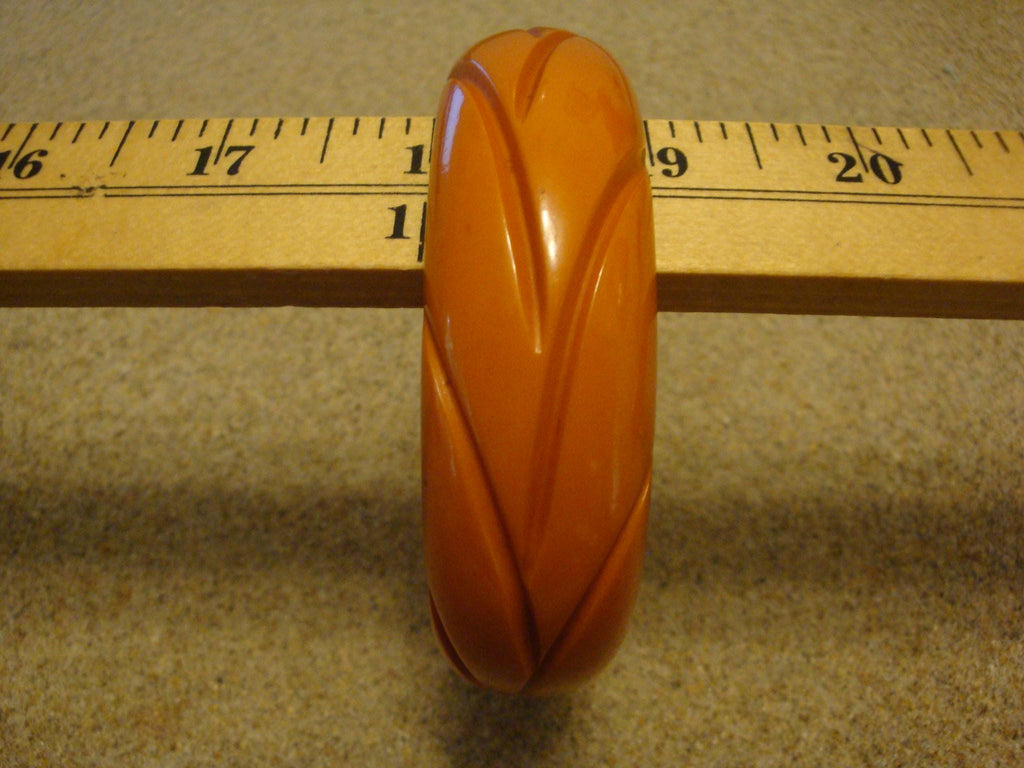 Vintage Burnt Orange Bakelite Bracelet: Abstract Vine Carvings