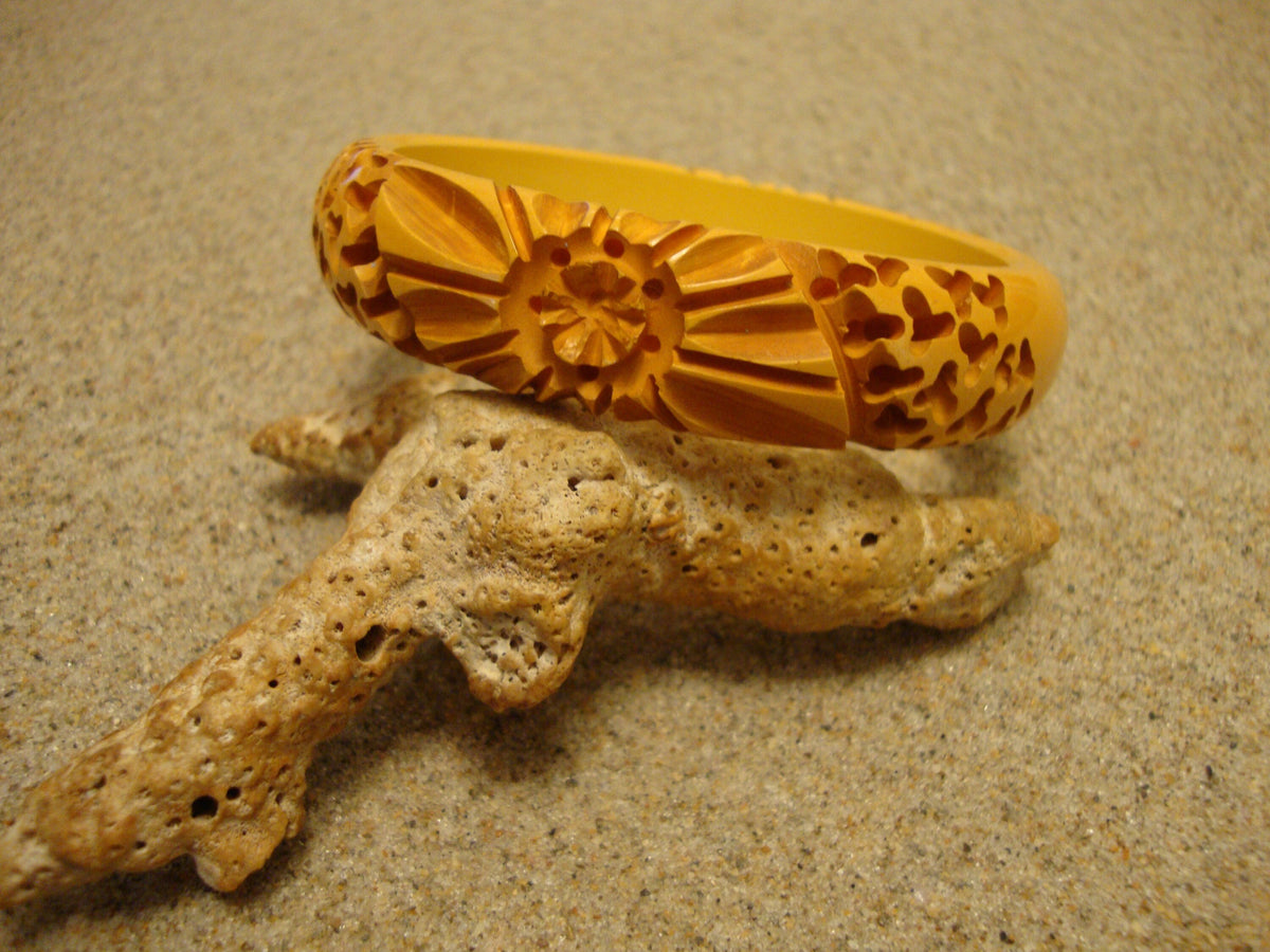 Vintage Goldenrod Bakelite Bracelet: Carved Flower & Wormwood Design