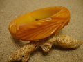 Vintage Yellow Bakelite Bracelet: Carved Flower & Leaf Design