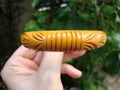 Vintage Goldenrod Bakelite Bracelet: Carved Wheat Sheaf Design