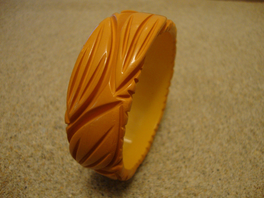 Vintage Goldenrod Bakelite Bracelet: Carved Leaf Design