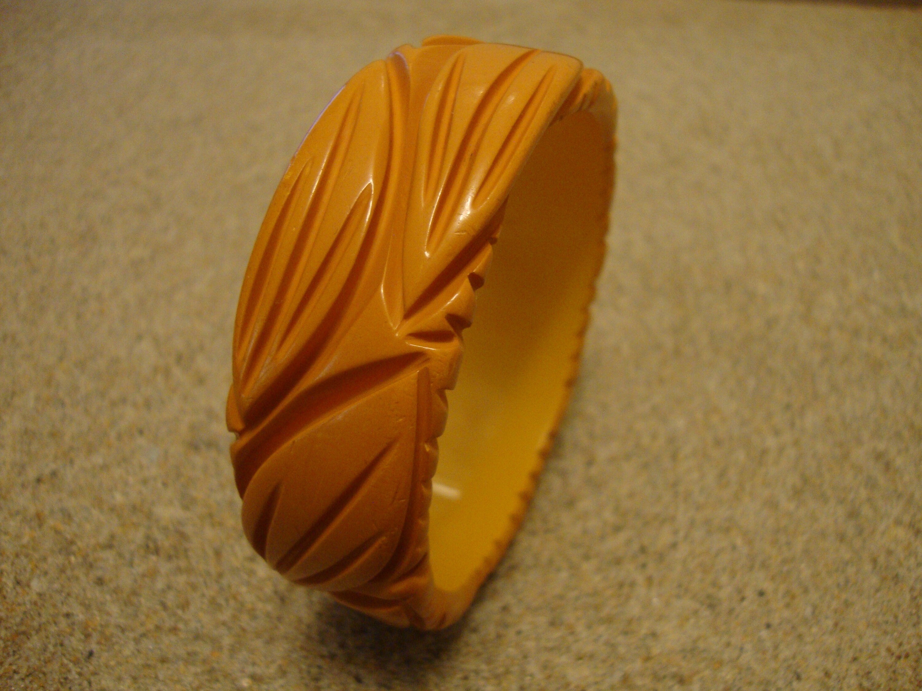 Vintage Goldenrod Bakelite Bracelet: Carved Leaf Design