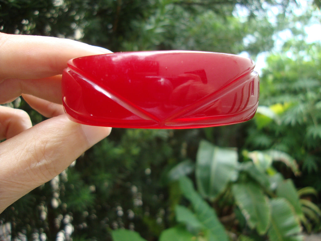 Vintage Ruby Red Bakelite Bracelet: Abstract Flower Carvings