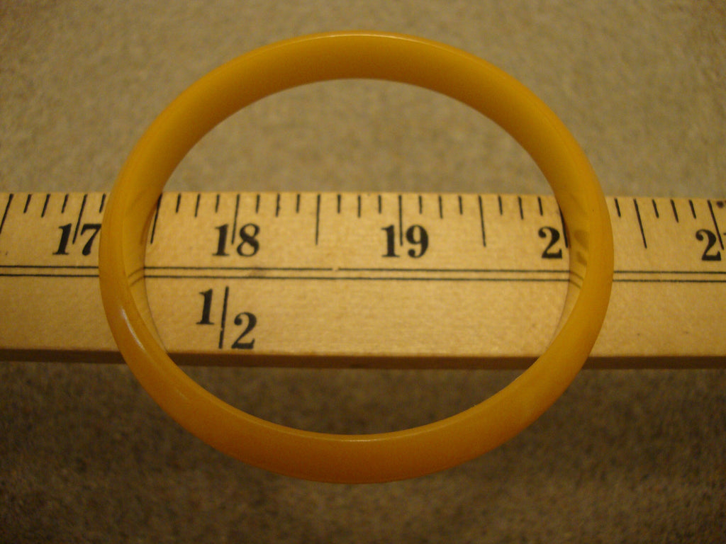 Vintage Lemon Yellow Bakelite Bracelet: Flying Saucer Bangle