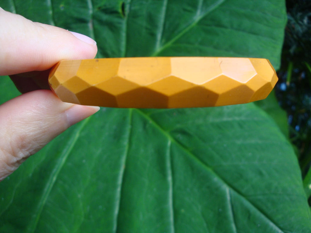 Vintage 1/2" Goldenrod Bakelite Bracelet w/ Diamond & Pentagon Shaped Facets!