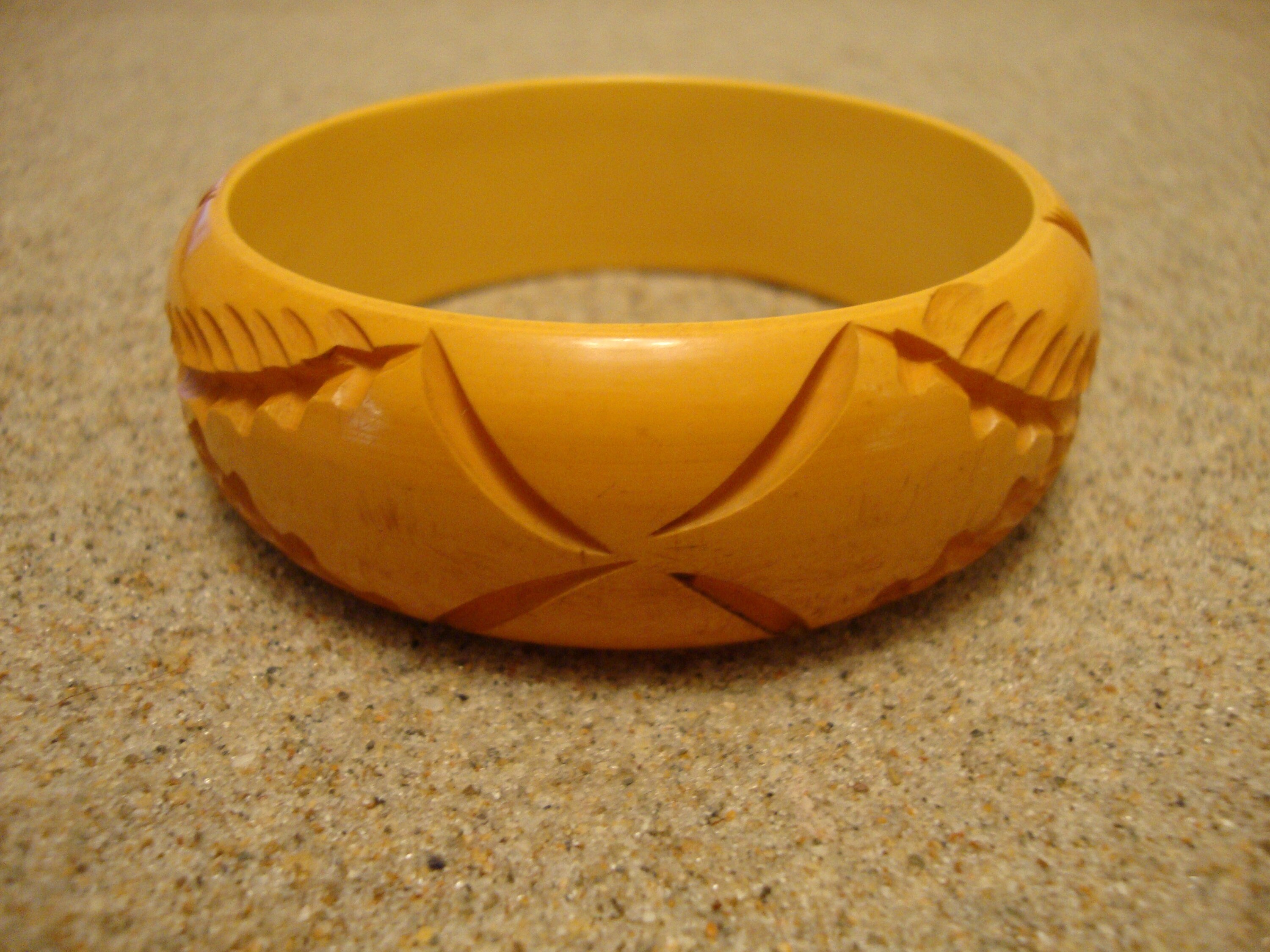 Vintage Goldenrod Bakelite Bracelet: Abstract Carved Design