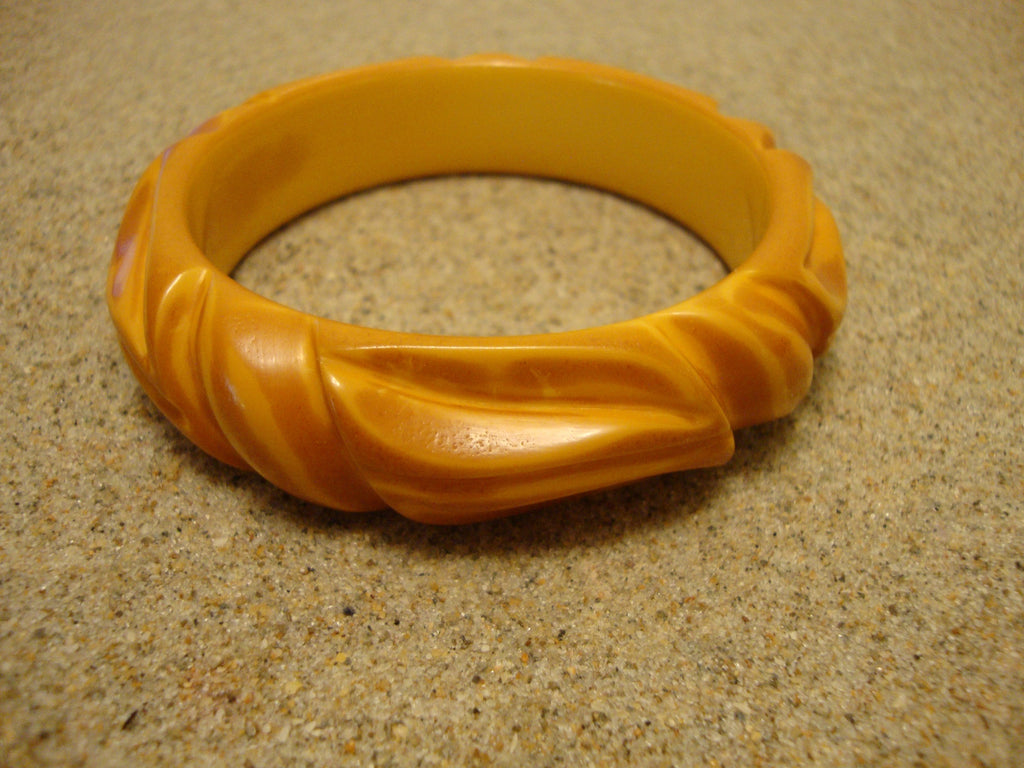 Vintage 3/4" Overdyed Butterscotch Bakelite Bracelet! Abstract Flower Carvings!