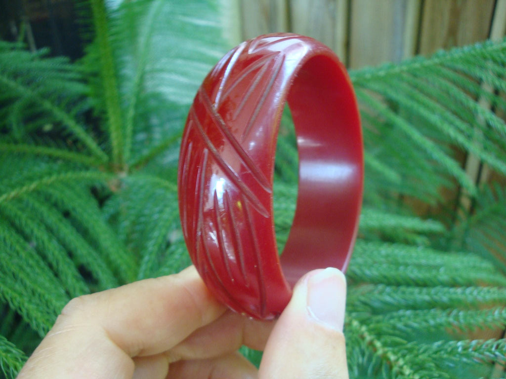 Vintage 7/8" Semi Translucent Ruby Red Bakelite Bracelet! Abstract Leaf Carvings!