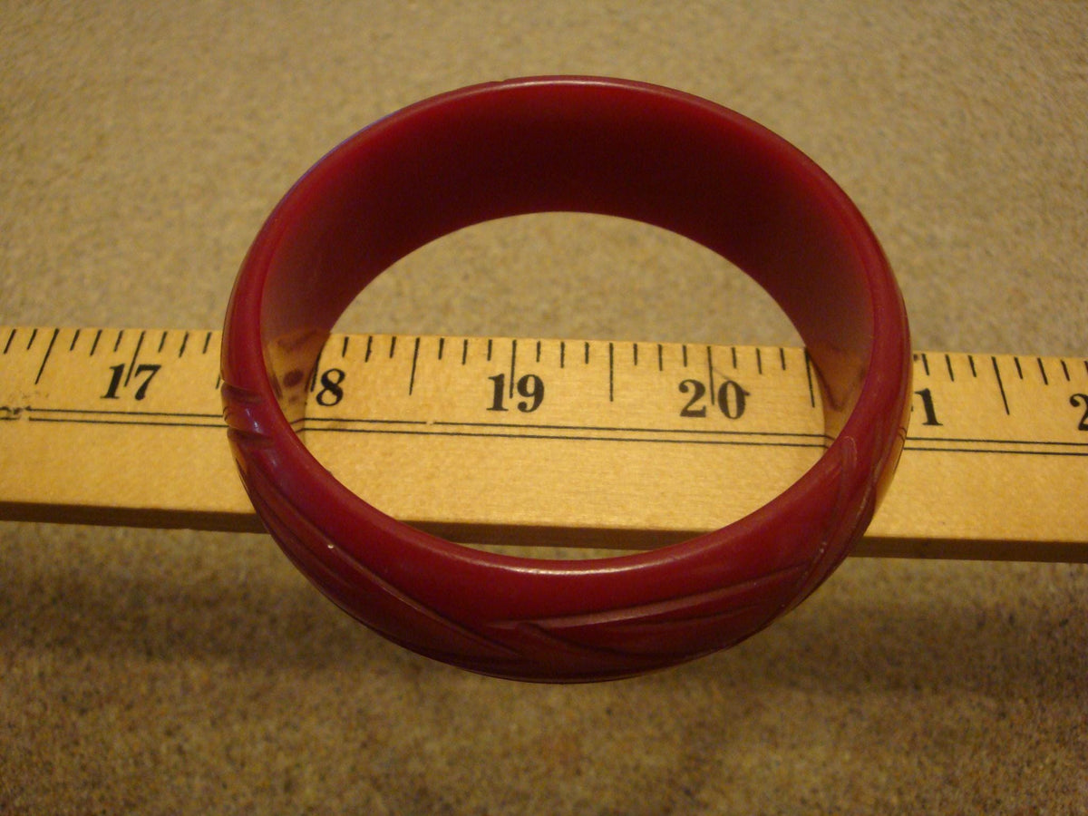 Vintage 7/8" Semi Translucent Ruby Red Bakelite Bracelet! Abstract Leaf Carvings!