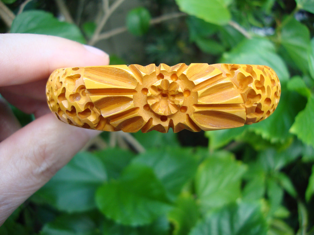 Vintage Goldenrod Bakelite Bracelet: Carved Flower & Wormwood Design