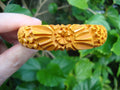 Vintage Goldenrod Bakelite Bracelet: Carved Flower & Wormwood Design