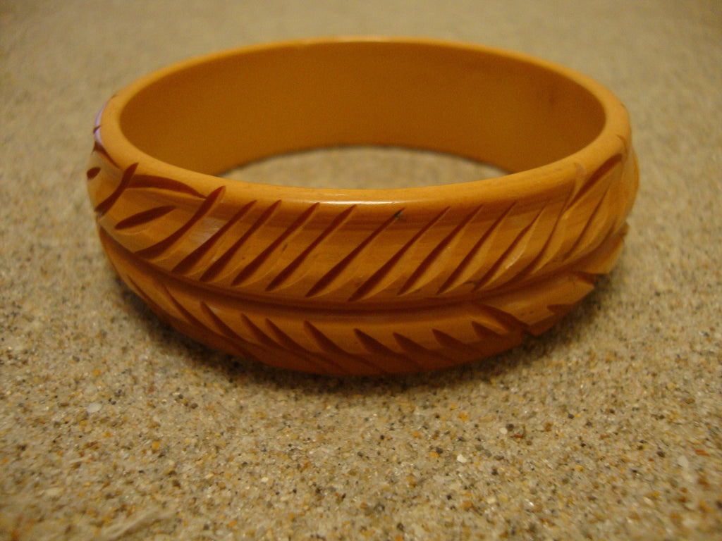 Vintage Goldenrod Bakelite Bracelet: Carved Vine & Leaf Design
