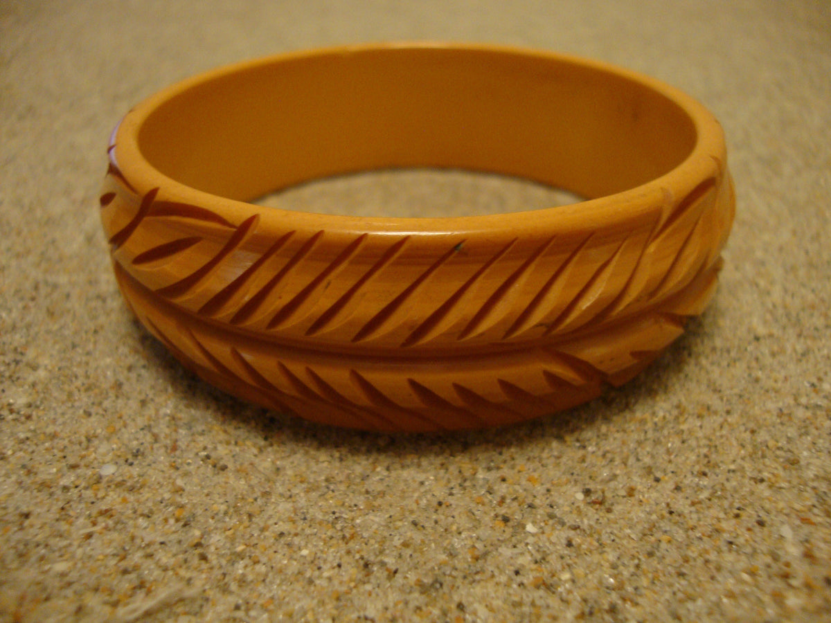 Vintage Goldenrod Bakelite Bracelet: Carved Vine & Leaf Design