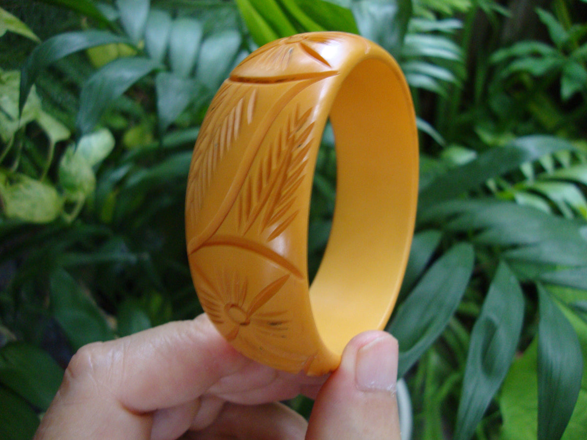 Vintage Goldenrod Bakelite Bracelet: Abstract Floral Carvings