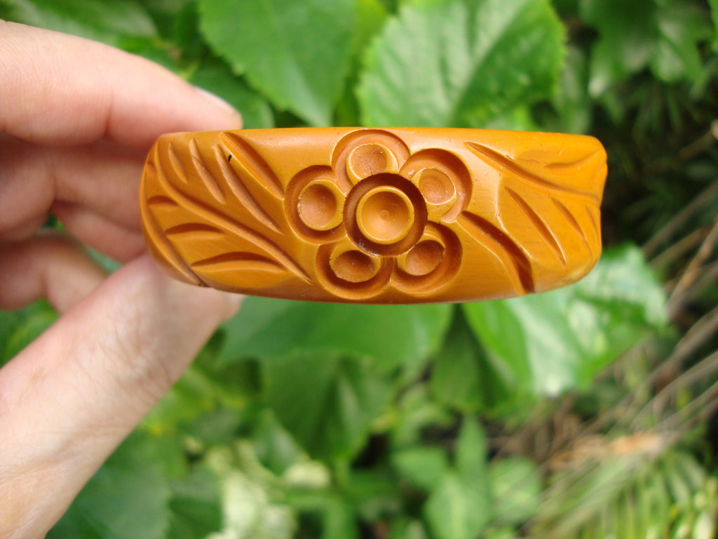 Vintage Burnt Orange Bakelite Bracelet: Carved Flower & Leaf Design