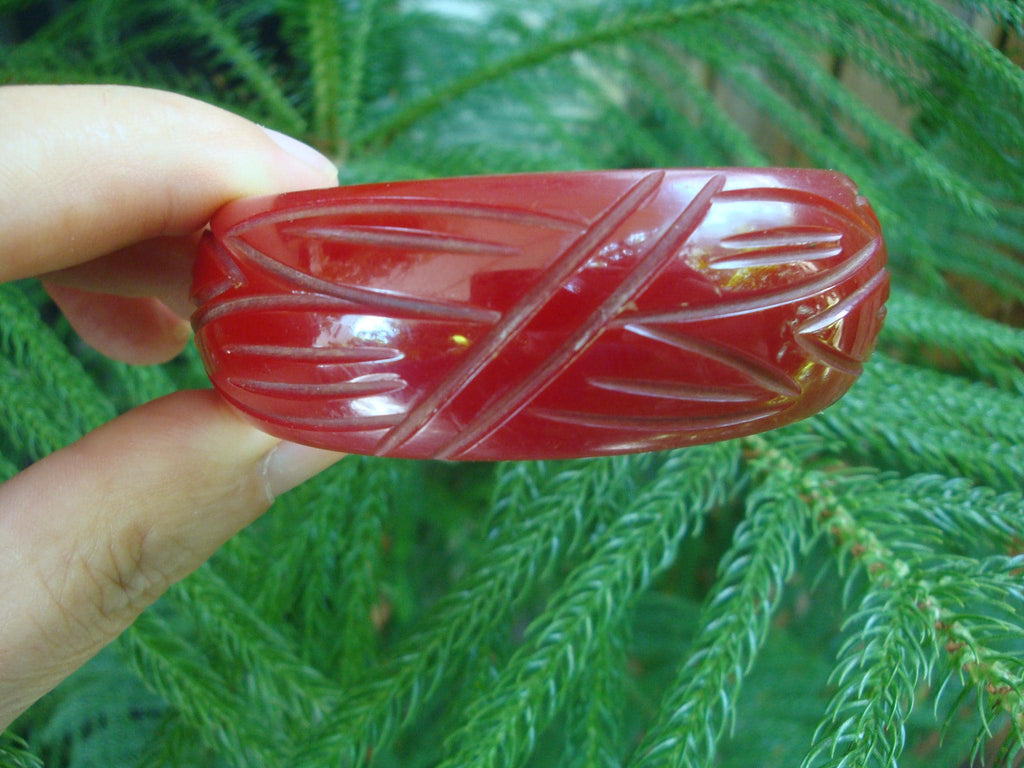 Vintage 7/8" Semi Translucent Ruby Red Bakelite Bracelet! Abstract Leaf Carvings!