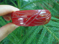 Vintage 7/8" Semi Translucent Ruby Red Bakelite Bracelet! Abstract Leaf Carvings!