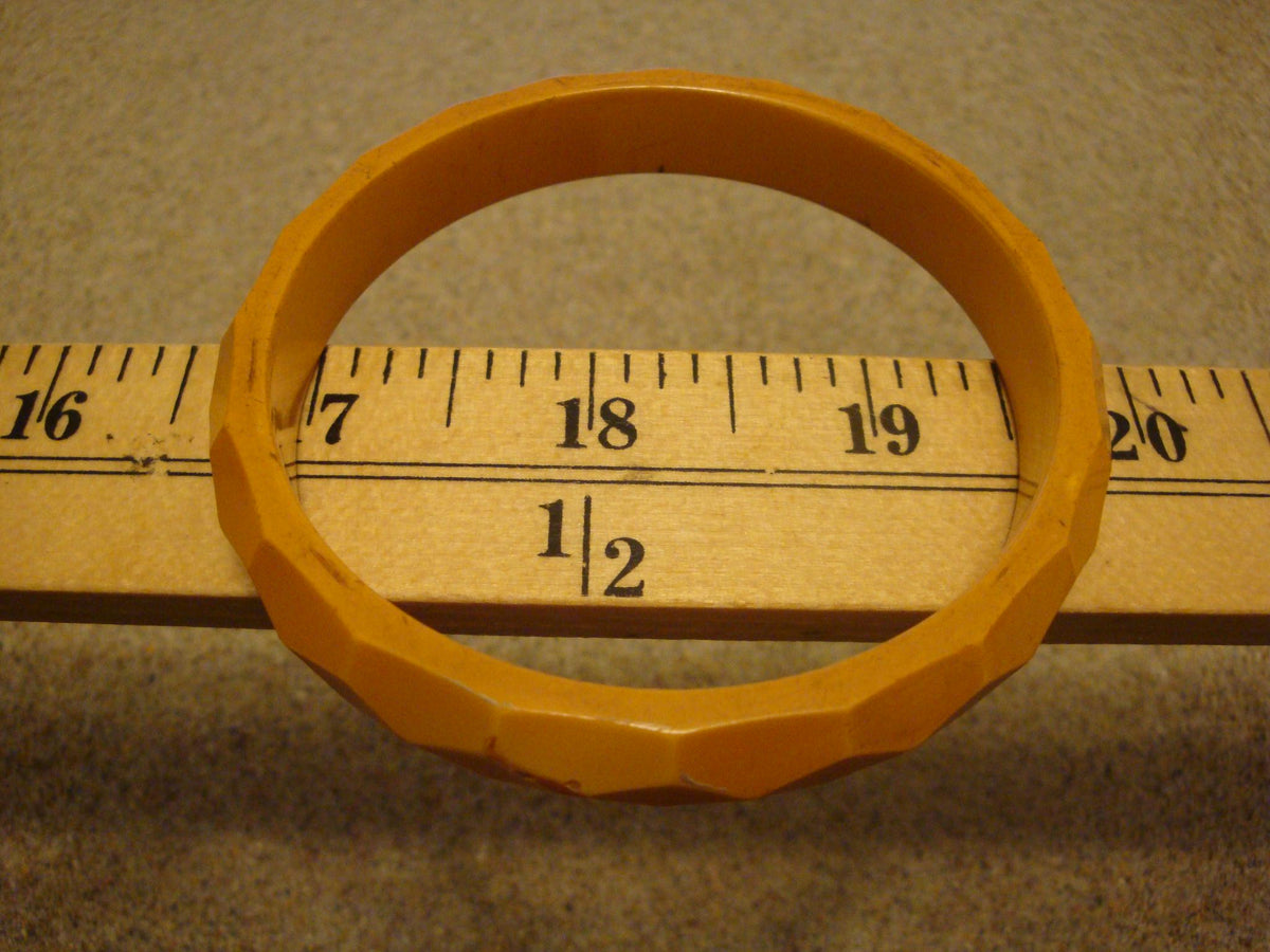 Vintage 1/2" Goldenrod Bakelite Bracelet w/ Diamond & Pentagon Shaped Facets!