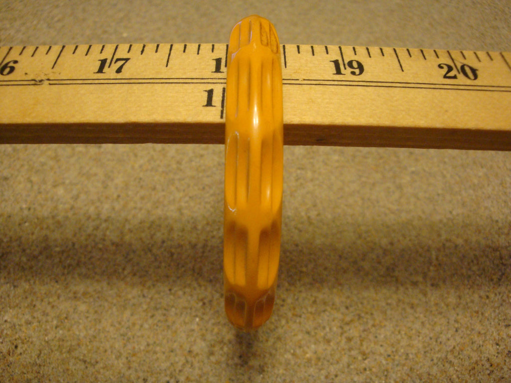 Vintage Goldenrod Bakelite Bracelet: Carved Thumbprint Design